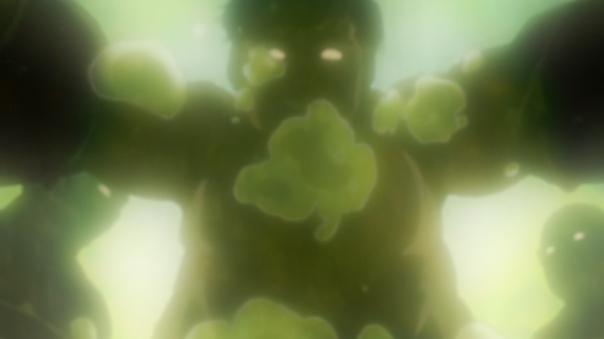 A creepy old man is vaguely visible through green tinted water, air bubbles floating to the surface